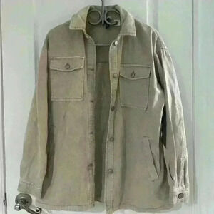 Divided unisex XS jacket in  cream colour and in perfect condition